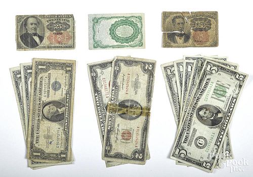 Assorted US currency, to include three one-dollar silver certificates, two two-dollar notes, a 1923