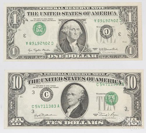 Two misprinted US notes, to include a 1977 one dollar and a 1981 ten dollar Federal Reserve notes.