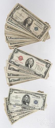 Forty-one two dollar US notes with red seals, forty-one dollar silver certificates, and five 5 dolla