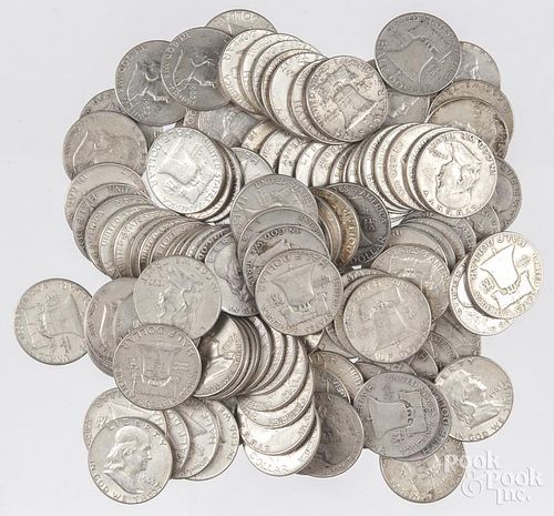 One hundred and twenty-two Franklin silver half dollars.