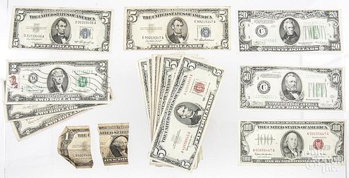Series 1966 red seal one hundred dollar bill, together with a 1934 C green seal fifty dollar bill, a