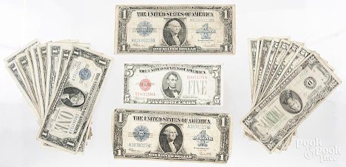 Thirty-three one dollar silver certificates, to include two 1957 star notes, two 1928 ''funny backs'',