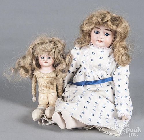 Two German bisque head dolls, to include one inscribed Alma, 16 1/2'' h. and one with a leather kid
