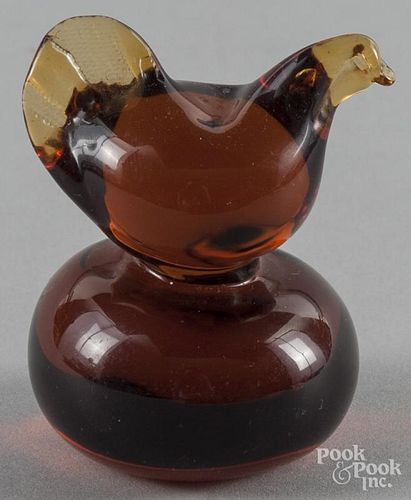 Amber glass whimsy paperweight, with a hen perched on a round base, 2 1/4'' dia.