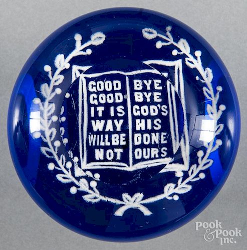 White frit religious paperweight on cobalt ground, with top facet, 3 5/8'' dia.