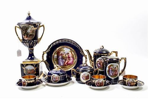 A Continental Porcelain Tea Service Height of teapot 8 inches.