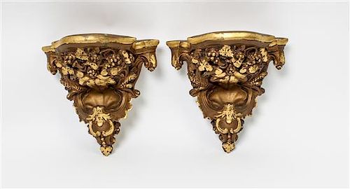 * A Pair of Giltwood Brackets Height 10 inches.