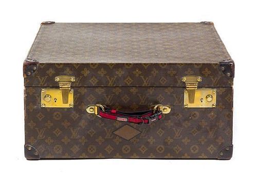 * A Louis Vuitton Monogram Canvas Hardsided Case Height 19 1/2 x width 19 1/2 x depth 9 1/4 inches.