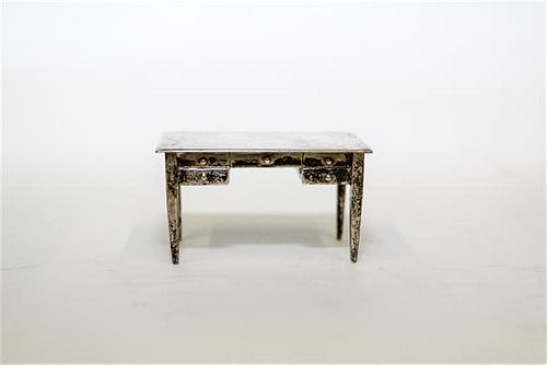 An American Silver Miniature Desk, International Silver Co., Meriden, CT, having a rectangular top over one long drawer and f