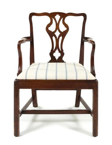 * A Chippendale Style Mahogany Armchair Height 36 inches.