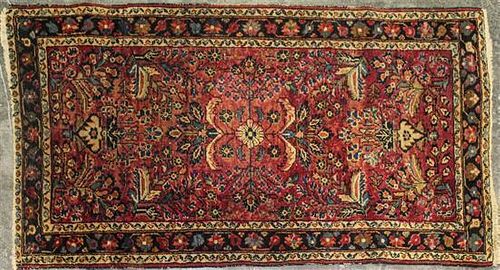 A Persian Wool Mat 4 feet 8 inches x 2 feet 7 inches.