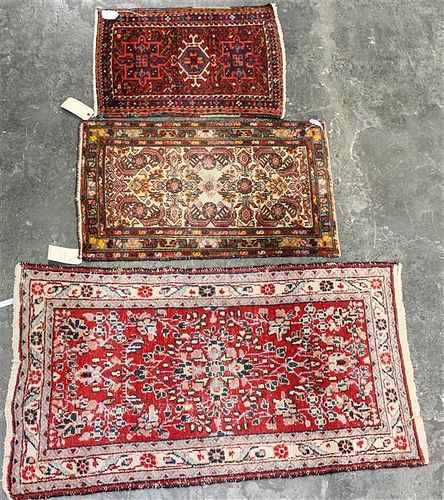 Three Persian Wool Rugs Largest 4 feet 3 inches x 2 feet 5 inches (of largest).