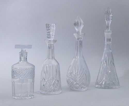 WATERFORD CUT-GLASS DECANTER AND STOPPER AND THREE OTHER DECANTERS AND STOPPERS