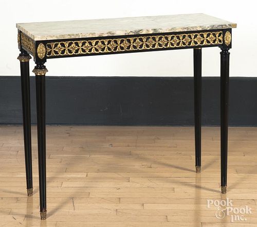 Marble top pier table with ebonized frame, 20th c.