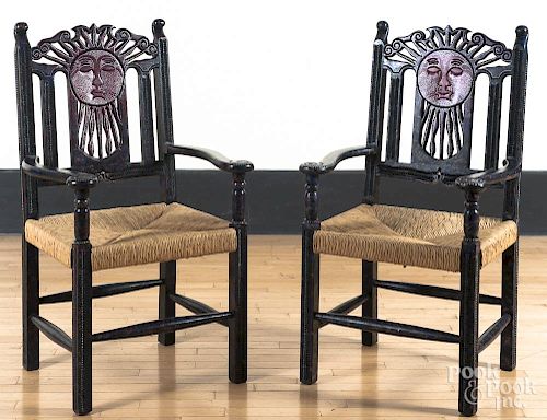 Pair of Mexican carved and painted armchairs.