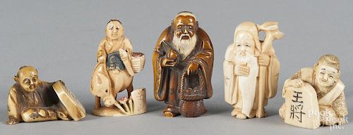 Five Japanese Meiji period carved ivory netsuke.