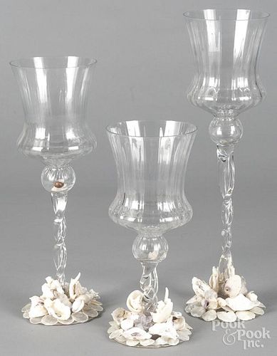 Three oversize colorless glass goblets with applie