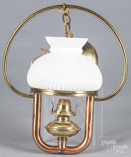 Brass and copper hanging light with milk glass sha
