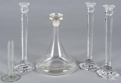 Three glass candlesticks, together with a decanter