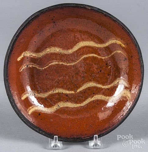 Pennsylvania redware pie plate, 19th c., with yell