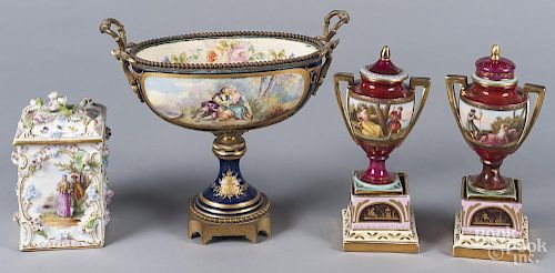 Pair of Dresden porcelain urns on plinths, togethe