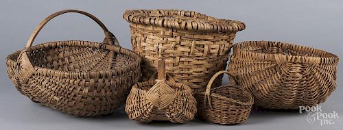 Five woven baskets.