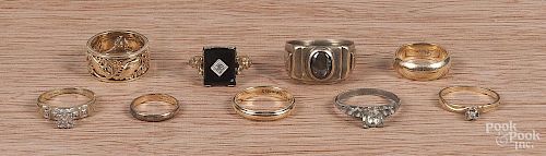 Group of nine rings, to include a 14K yellow gold