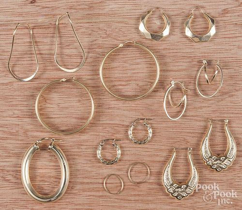 Seven pairs of 14K marked hoop earrings, together