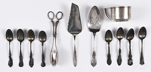 Nine sterling silver assorted teaspoons, together