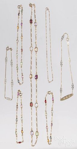 Four multi-colored gemstone and 14K gold pieces, t