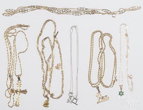 Group of gold bracelets and chains, to include a 14K gold chain, 6.1 g., an 18K necklace, 3.9 g, a 1