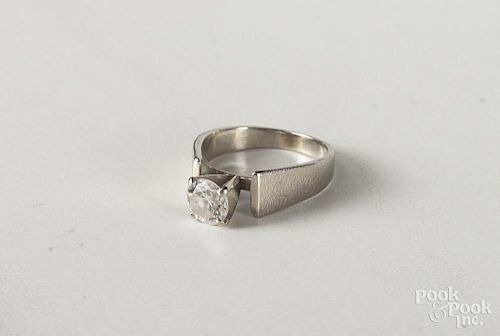 14K white gold engagement ring, with an approx. .72 carat diamond solitaire, size 5, 3.5 g.