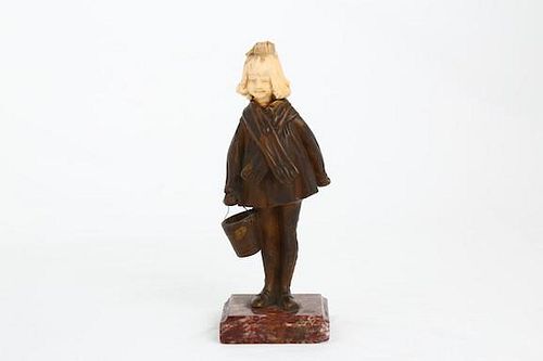 A bronze carved figure of a young girl