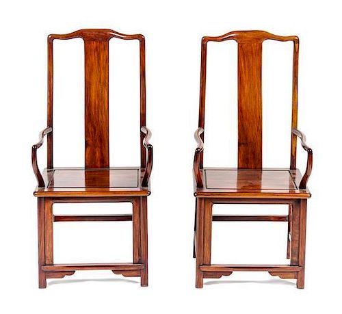 A Pair of Huanghuali Yokeback Chairs, Height 45 inches.