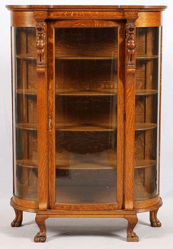 LATE VICTORIAN CARVED OAK DISPLAY CABINET