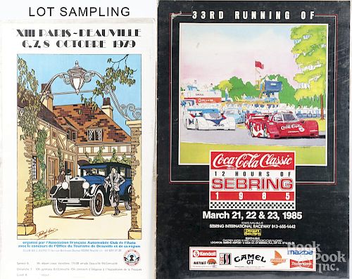 Group of unframed automobile posters.