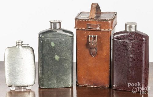 Pair of Stanley cased flasks, together with another flask.