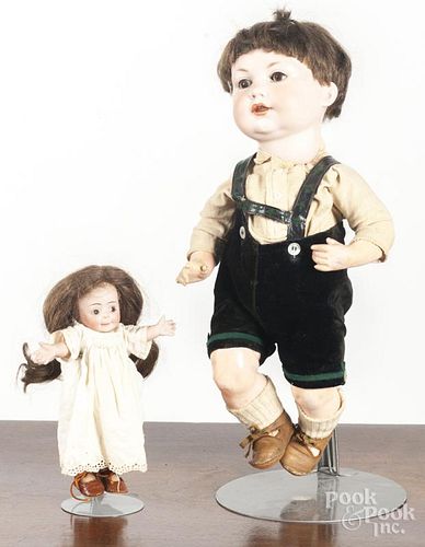 Armand Marseilles bisque head doll, together with a German bisque head googly eye doll.