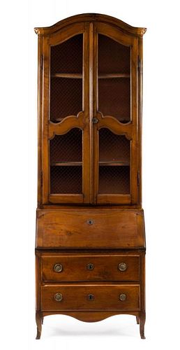 A Louis XV Provincial Style Walnut Secretaire en Bibliotheque Height 96 3/8 x width 32 3/4 x depth 16 3/4 inches.