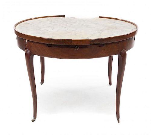 A Louis XV Style Walnut Center Table Height 27 x diameter of top 37 1/2 inches.