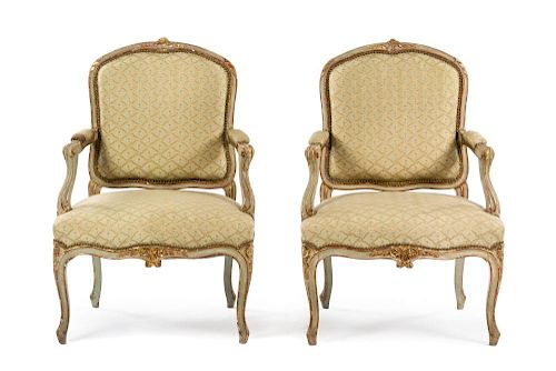 A Pair of Louis XV Style Painted and Parcel Gilt Fauteuils Height 38 1/4 inches.