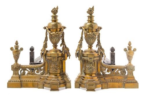 A Pair of Louis XVI Style Brass Chenets Height 13 1/2 inches.