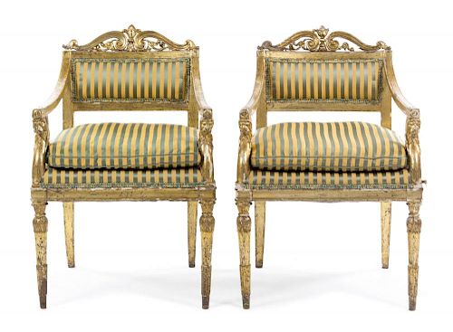 A Pair of Continental Giltwood Armchairs Height 35 inches.