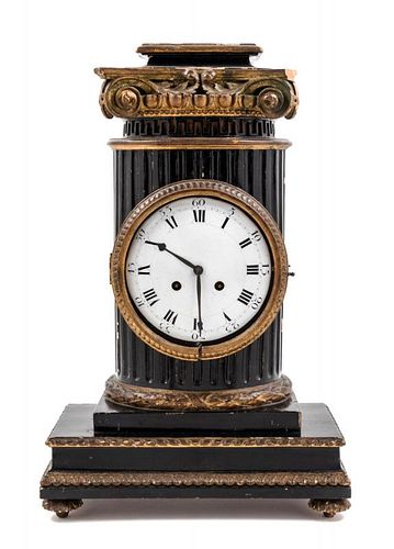 A Continental Ebonized and Giltwood Mantel Clock and Stand Height of clock 17 3/4 inches.