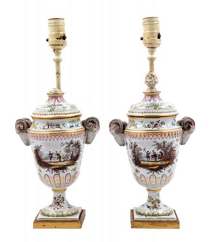 A Pair of Painted Faience Urns Mounted as Lamps Height overall 15 1/4 inches.