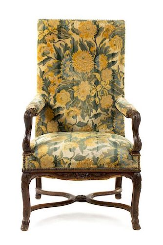 A Regence Oak Fauteuil Height 43 inches.