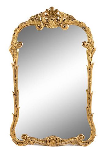 A Louis XV Style Giltwood Mirror Height 46 3/4 x width 28 inches.