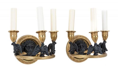A Pair of Empire Style Gilt and Patinated Bronze Three-Light Sconces Height 6 x width 7 inches.