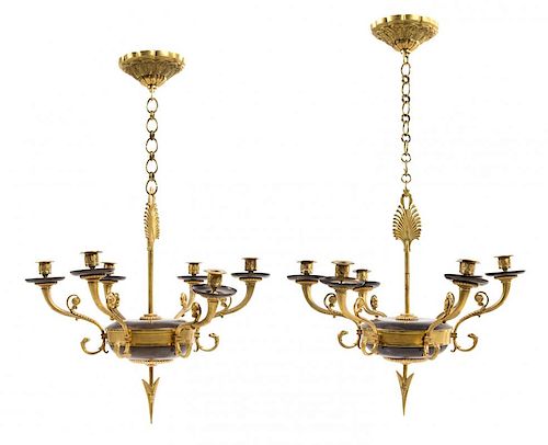 A Pair of Empire Style Gilt and Patinated Bronze Six-Light Chandeliers Height 35 x diameter 20 inches.