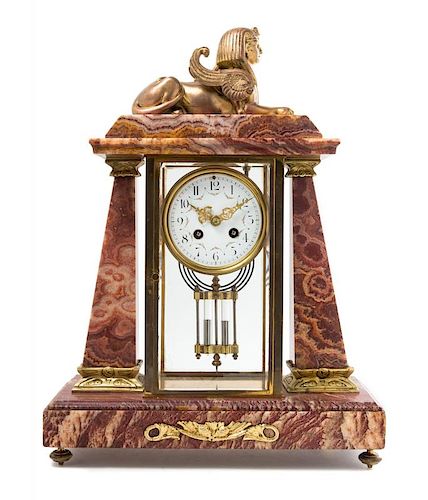 An Egyptian Revival Marble Clock Height 18 3/4 inches.